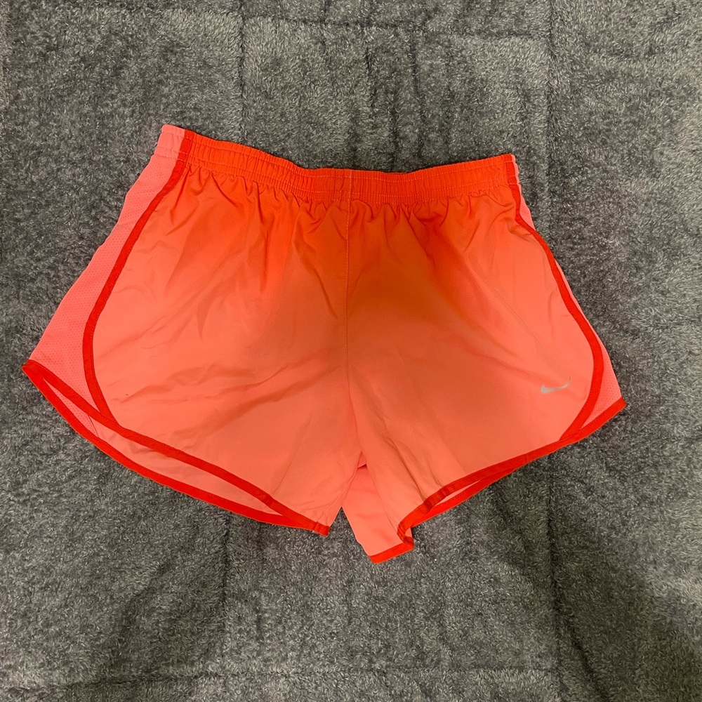 Orange and pink Nike girls large dri-fit shorts